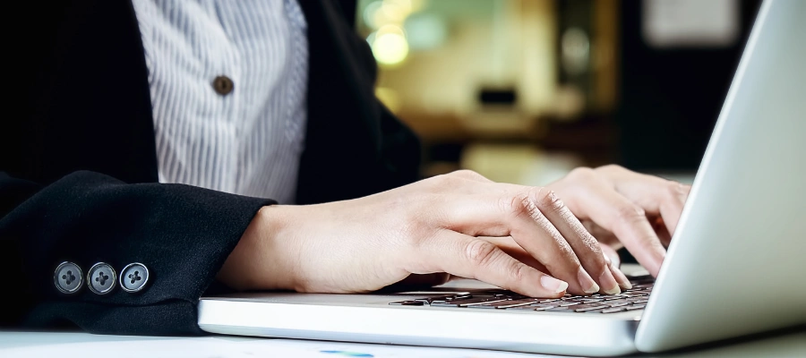 businesswoman hands typing on keyboard